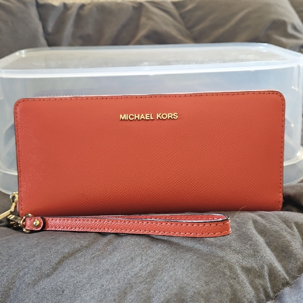 Michael Kors Leather Continental Wristlet.  Coral color.